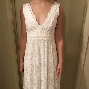 Boho-chic White Lace Gown with Deep V